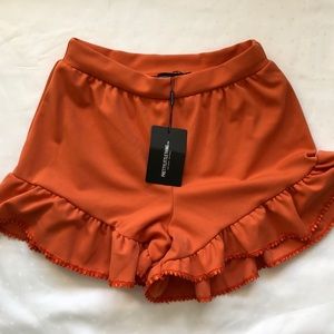 PLT orange floaty frill hem shorts
